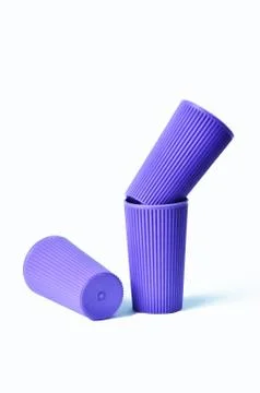 Blue empty plastic cup isolated on white Stock Photos