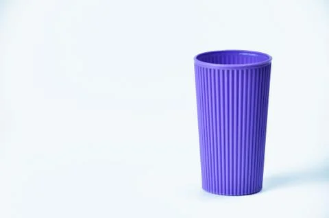 Blue empty plastic cup isolated on white Stock Photos