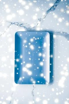 Blue empty plate on marble table flatlay background, tableware decoration for Stock Photos