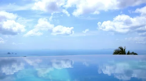 Blue Endless Swimming Pool with Blue Sky and Clouds Stock Footage 49757747