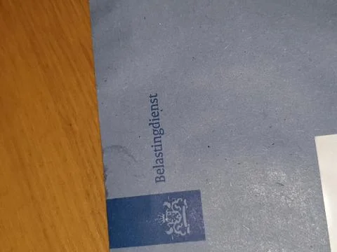 Blue envelop with payment notes sent by the dutch tax authority named Belasti Stock Photos