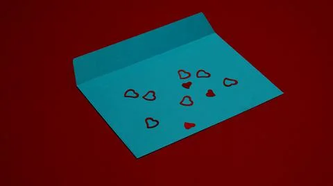 Blue envelope on red background covered Stock Photos