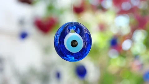 Blue Evil Eye Charms on a Tree in Sığacık, Turkey. 4K. Stock Footage 155914519