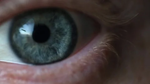 Blue eye blinking ultra close Video stock 94411962