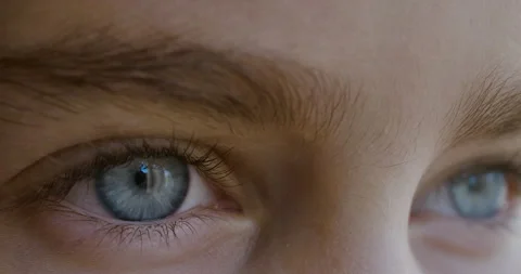 Blue Eye of Child Looking Intro Distance Close Up. Macro Shot Opening and Clo Video stock 141185502