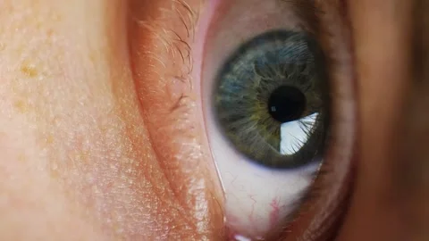 Blue Eye Close Up. Vertical Video Stock Footage 130947992