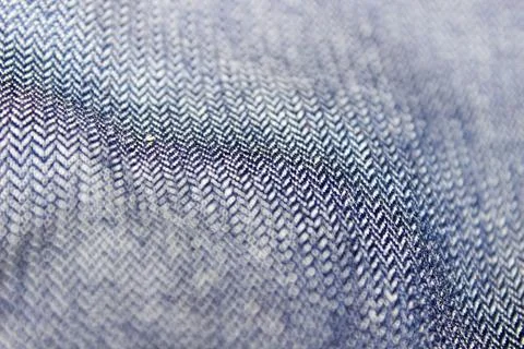 Blue fabric texture close-up with blurred edges. Foto stock