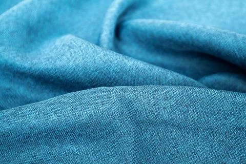 Blue fabric texture close up , focus only one point , soft blurred background Foto stock