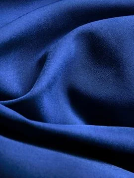 Blue Fabric Texture With Elegant Soft Folds Stock Photos