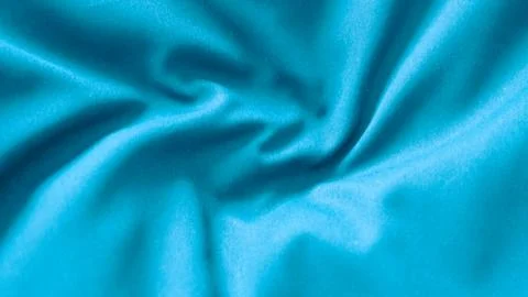 Blue fabric texture with soft waves close up. Foto stock