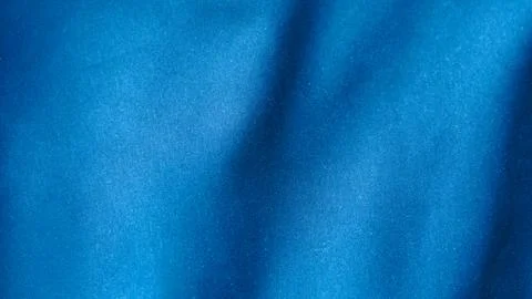 Blue fabric texture with soft waves close up. Foto stock