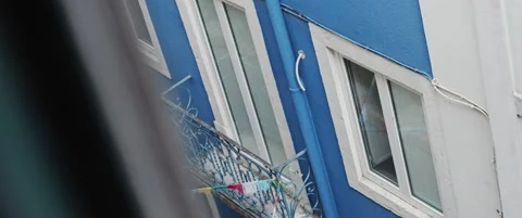 Blue facade of a residential building Stock Footage 151394579