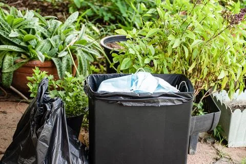 Blue face mask can protective Covid-19. Many a face mask used to leave in t.. Stock Photos