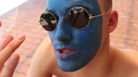 Blue face smoker cannot quit (1/3) Stock Footage 48387879