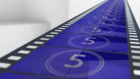 Blue film strip with countdown frames moving to the cinema camera on the white Stock Footage 232519241
