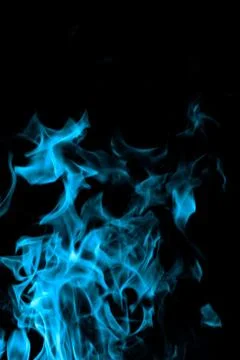Blue fire on black background Stock Photos