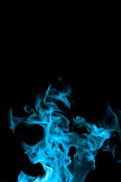 Blue fire on black background Stock Photos