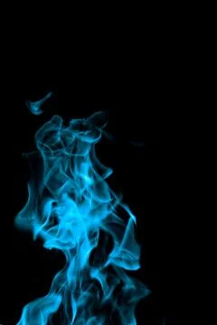 Blue fire on black background Stock Photos