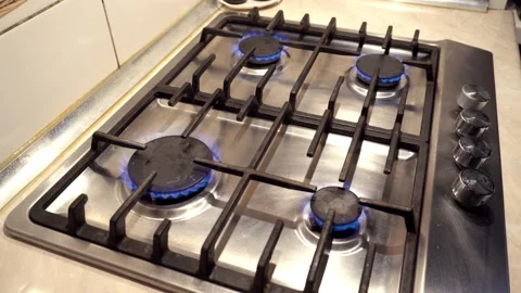 A blue fire is burning on gas stove. Gas at home Stock Footage 218282984