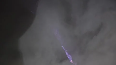 Blue Fire Emissions and Volcanic Smoke at Night on Mount Ijen Crater, East Java Stock Footage 334090116