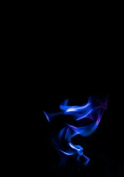 Blue fire forms abstraction in black background Stock Photos