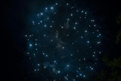 Blue firework in the sky Stock Photos