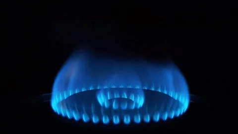 Blue Flame Burning on Gas Stove Burner Close Up in Dark Kitchen 4K Stock Footage 340413822