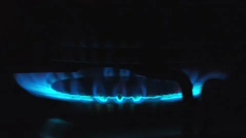 The blue flame of the gas burner on the kitchen stove Stock Footage 227049342