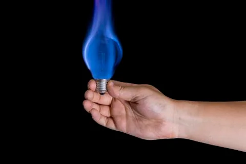 Blue flame lightbulb Stock Photos