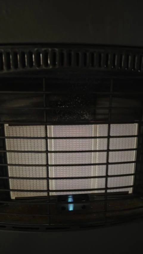 Blue flickering gas flames increase as heater power is raised Stock Footage 329469697