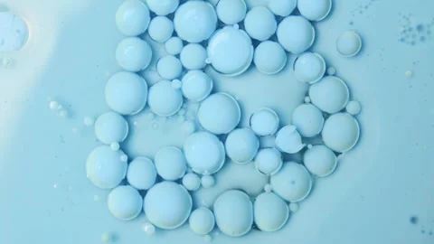 Blue floating bubbles on an oil basis. Acrylic paint. Abstract background. Stock Footage 266973726