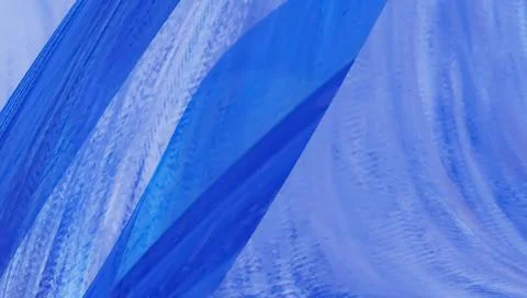 Blue flowing liquid waves abstract motion blurred background. Stock Illustration