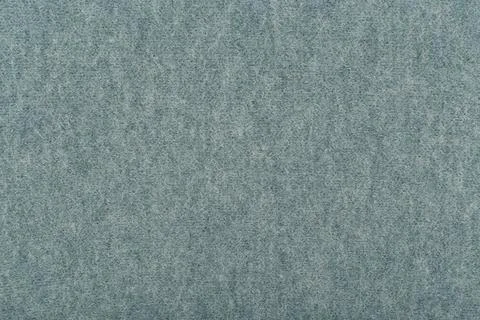 Blue fluffy material close up. Knitted texture background Stock Photos