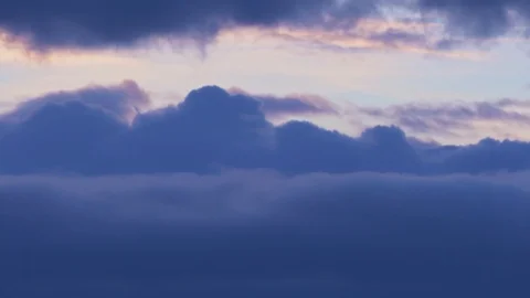Blue fluffy puffy clouds that roll beautifully across the heaven. 4K Timelapse Video stock 106015289