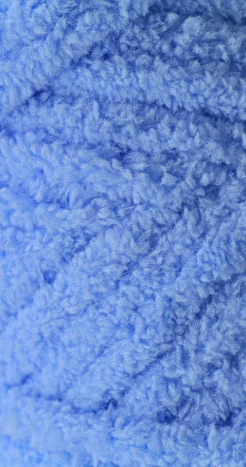 Blue fluffy yarn texture. Stock Footage 338328015