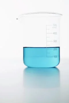 Blue fluid in beaker Stock Photos