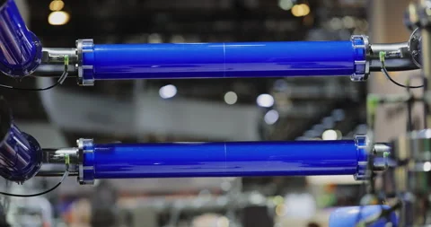 Blue fluid flows through clear glass tubes in distillation and rectification Stock-Footage 346232373