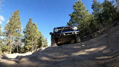 Blue Ford Bronco - Drives over camera Stock-Footage 170900828