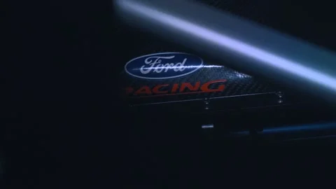 Blue Ford Racing Logo on Engine Cover Coming into Light. Video stock 131562009
