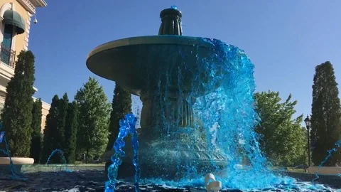 Blue Fountain Flowing Stock Footage 90528228