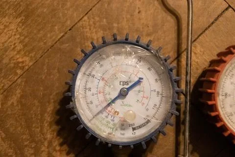Blue freon manometer close up. Stock Photos