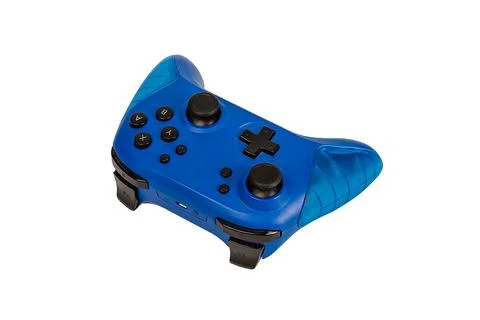 Blue game controller for playstation on a white isolated background. Stock Photos