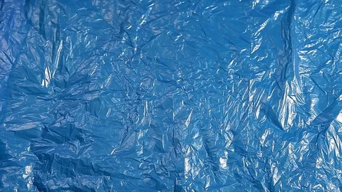 Blue garbage package shine background hd footage Stock Footage 119308277
