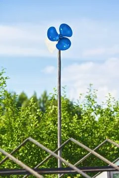 Blue garden windmill Stock Photos