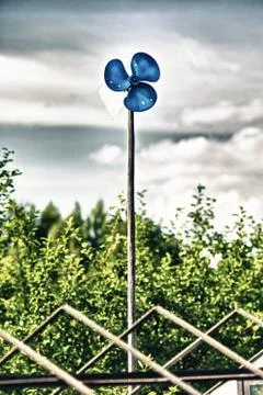 Blue garden windmill Stock Photos
