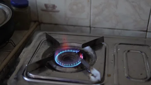 Blue Gas Flame Burning on Kitchen Cooker – Clean Energy Cooking Concept Stock Footage 326987899