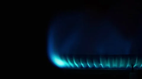 Blue Gas Flame Burning On Kitchen Stove Burner Isolated On Black Background Stock Footage 328887389