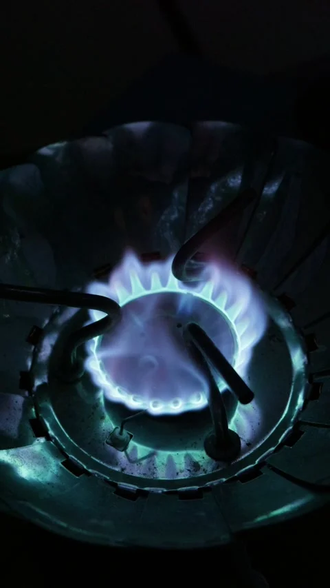Blue Gas Flame Burning on Portable Stove During Outdoor Camping Night Stock Footage 341996975
