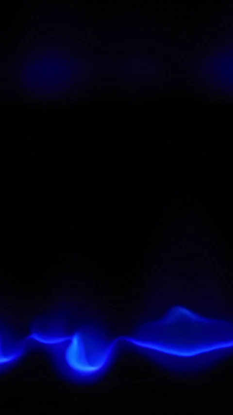 Blue gas flame igniting burner in darkness. Vertical 스톡 동영상 331997322