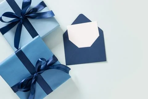 Blue gift box envelope greeting card Stock Photos